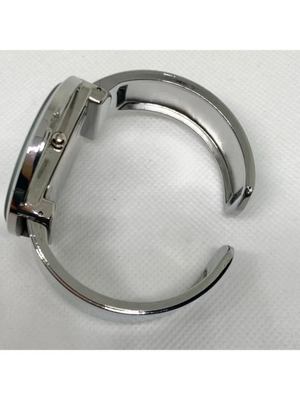 Cansnow silver black tone cuff bracelet women’s watch 42mm  quartz 6.5” running
